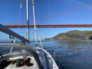 Boat Sailing towards the golden gate bridge
